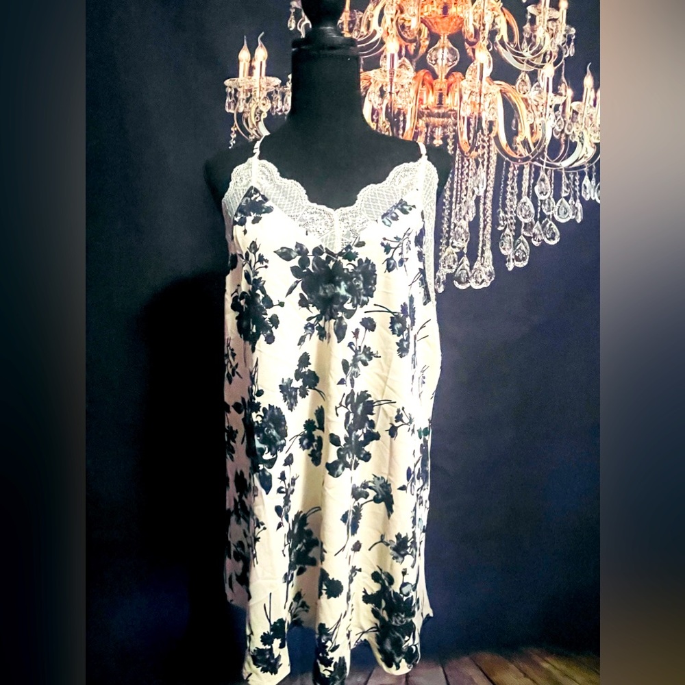Cream colored camisole with black flowers and lace